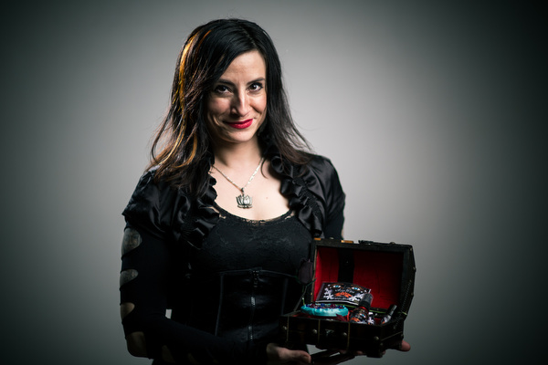 Aziza Poggi with her perfumes and scented products.