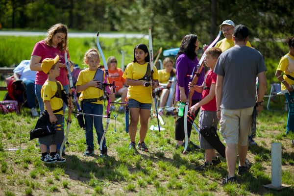 Kids gather at the line to shoot.