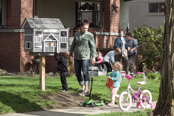 Neighborhood kids enjoy the library on their street.