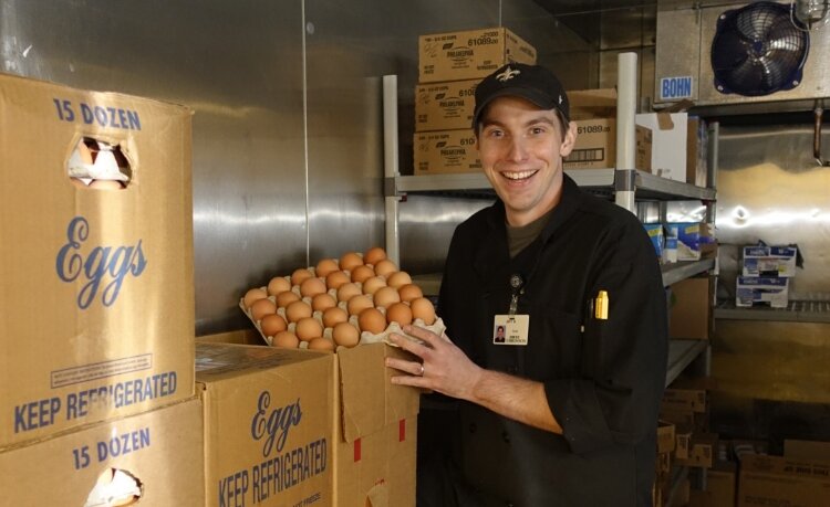 Jeff Burnell, operations manager for food & retail services at Bronson Methodist Hospital, holds eggs. 