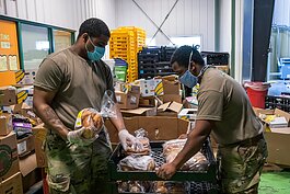 Michigan National Guard members volunteer at Food Gatherers.