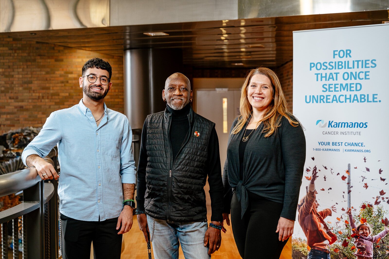 Dr. Theresa Hastert (right) helped develop the Michigan Community Outreach to Address Financial Toxicity (MI-COST). Ali Fakih (left) is a research assistant with MI-COST, and Cornelius Wilson (center) sits on its Community Advisory Board.