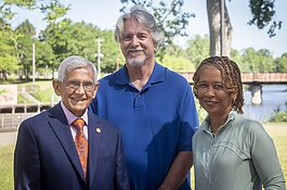 AARP Michigan volunteer Howard Pizzo, AARP Michigan Communications Manager Mark Hornbeck, and AARP Michigan State Director Paula Cunningham on the Lansing River Trail.