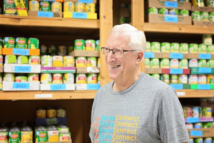 Volunteer Russ Harmsen tracks inventory.