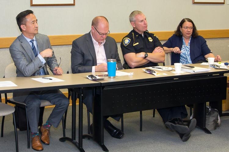 Grace Health president/CEO Dr. Peter Chang, United Way of the Battle Creek and Kalamazoo Region president and CEO Chris Sargent, Battle Creek Police Department chief Jim Blocker, and Family and Children Services CEO Sherry Thomas-Cloud.