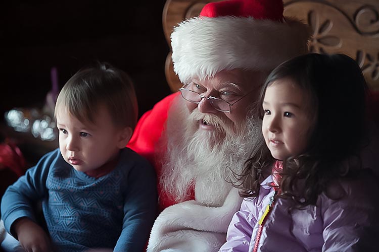 A moment with Santa at Peacock Family Farm. Photo by David Trumpie