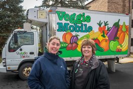 Sara Gould and Stacey Tilton with the Veggie Mobile.
