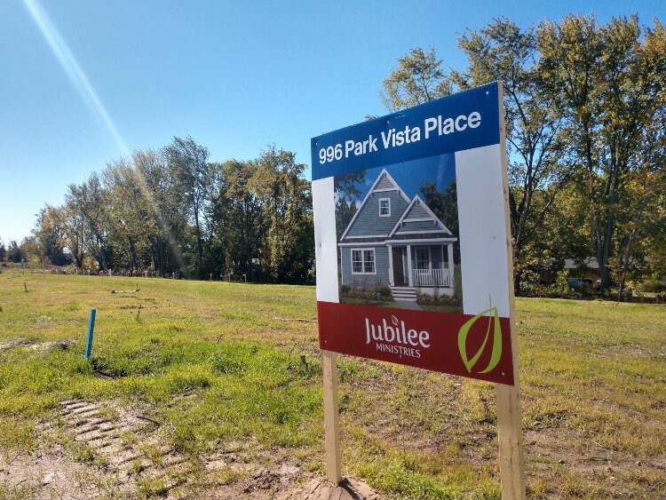 A sign shows one home that will soon be built at Park Vista Place on East 40th Street in Holland.