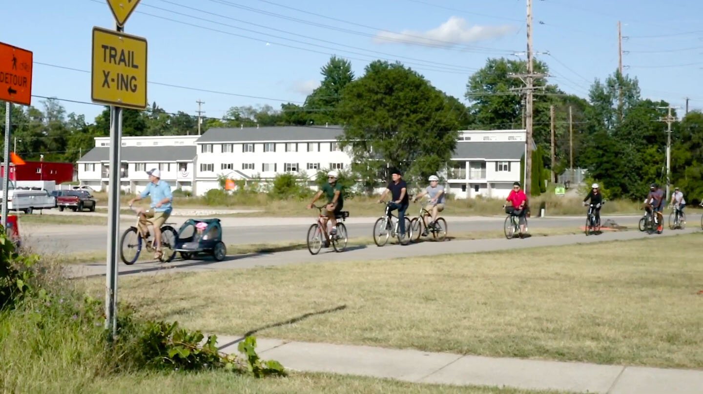 Families ride bikes in Traverse City.