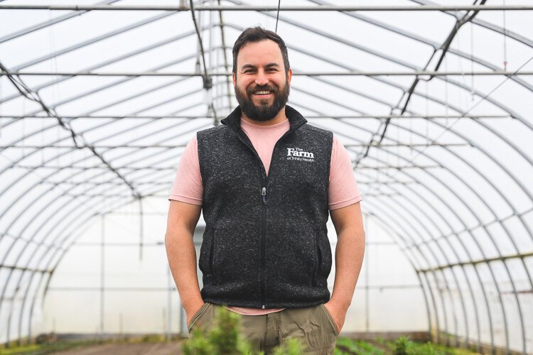 Farmer Will Jaquinde works at the The Farm at Trinity Health Ann Arbor (THAA).