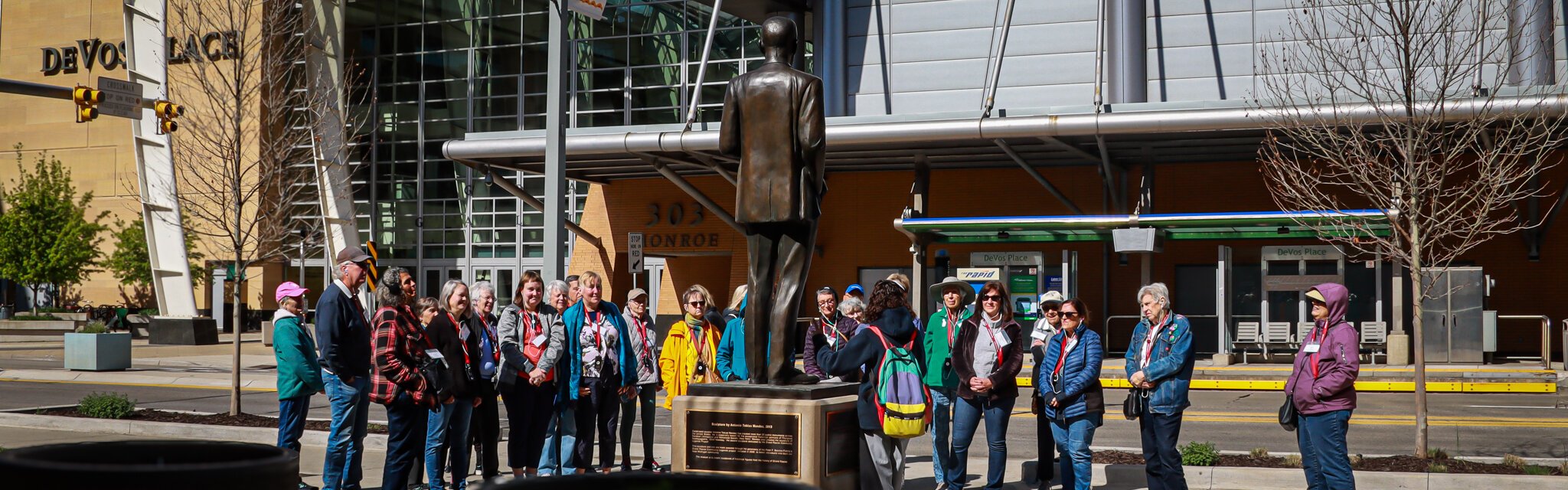 Tour groups explore our history, as seen in this statue honoring Lyman Parks, the city’s first African American mayor.