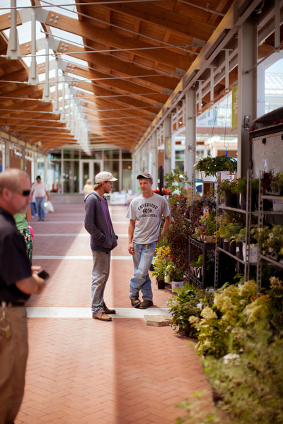 Community members enjoy the outdoor stalls.